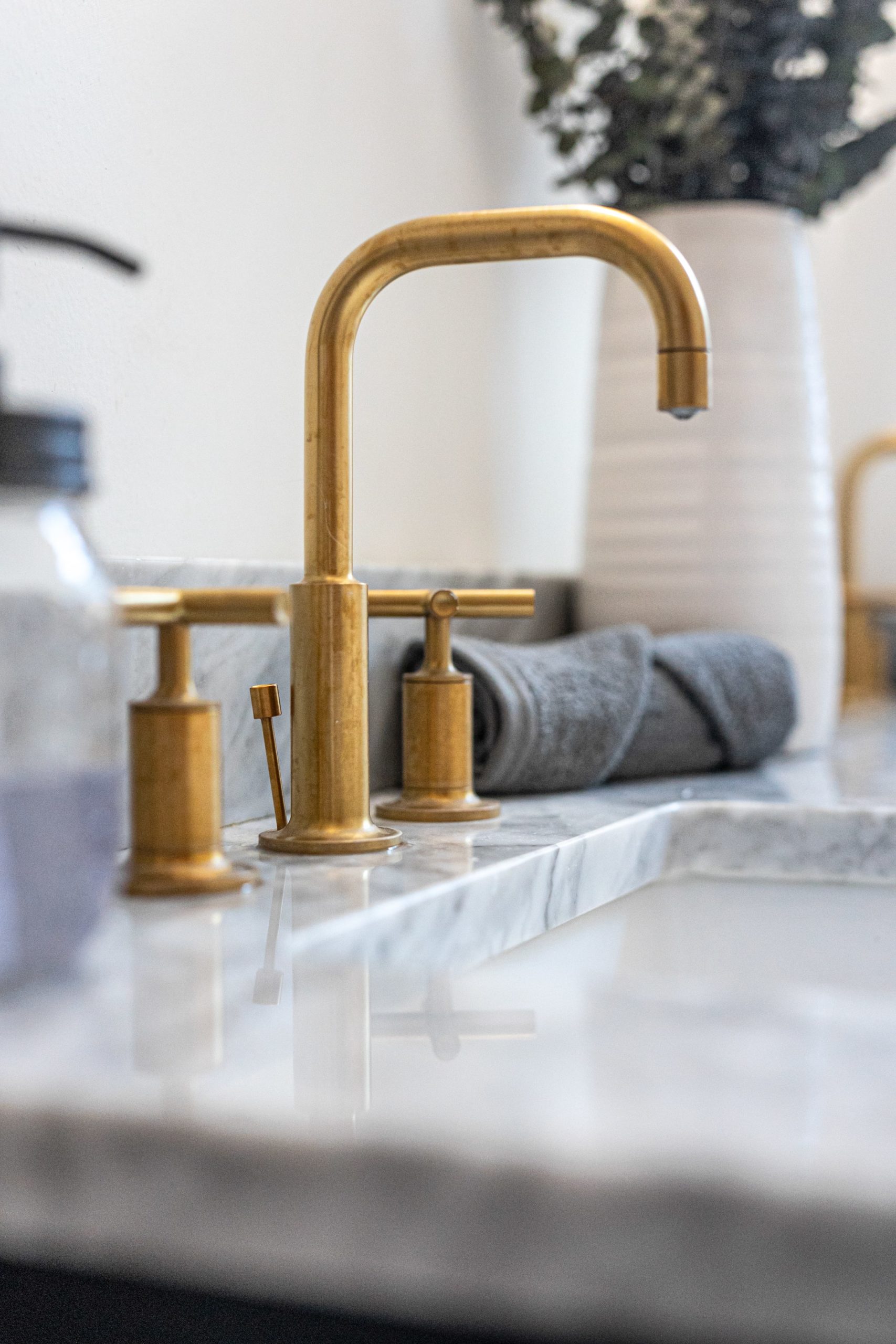 gold colored bathroom faucet
